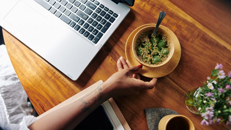 Woman eating at workplace