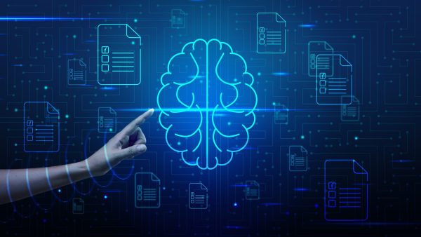 A woman’s hand points to the brain icon, artificial intelligence