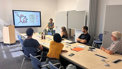 Teilnehmer einer Veranstaltung zur Ergonomieanalyse